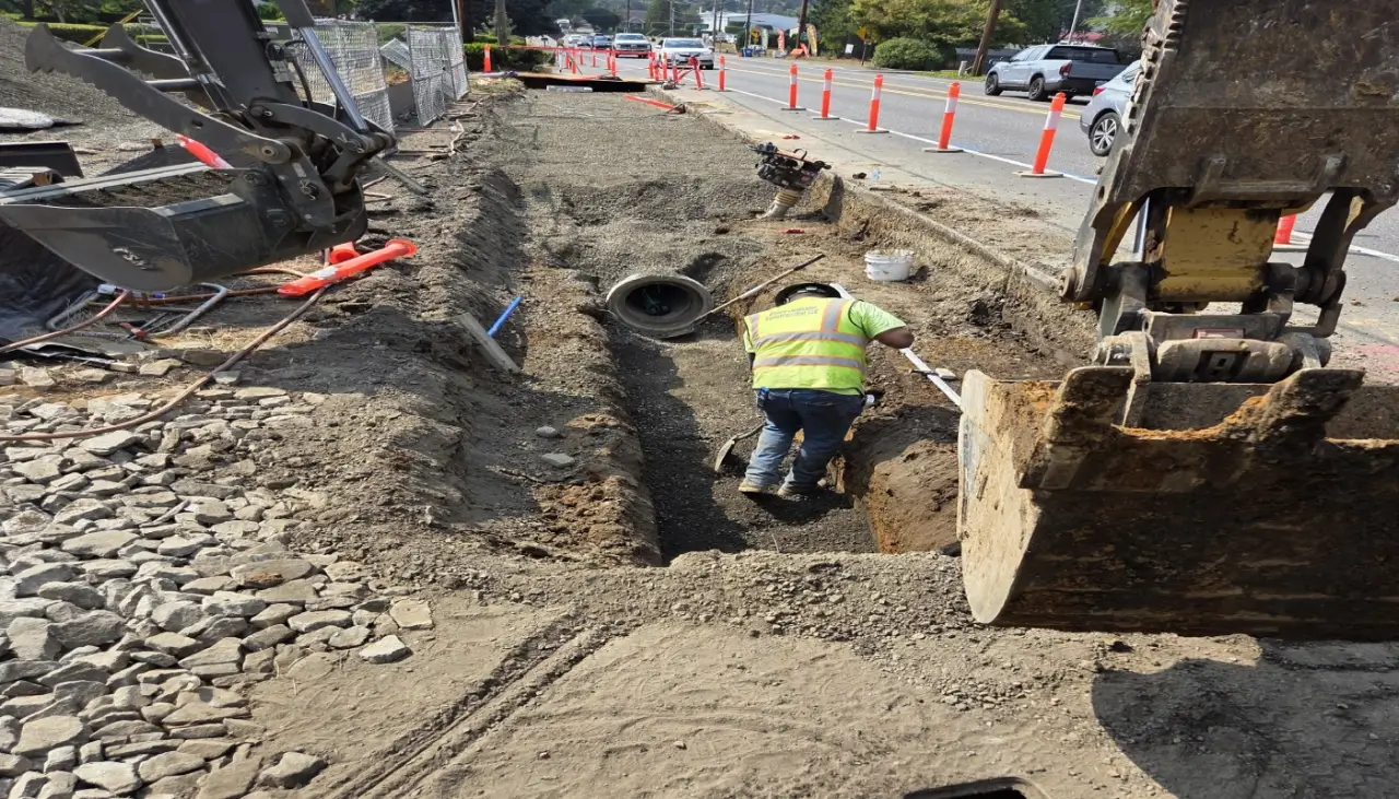 Heavy equipment performing site grading and earthworks